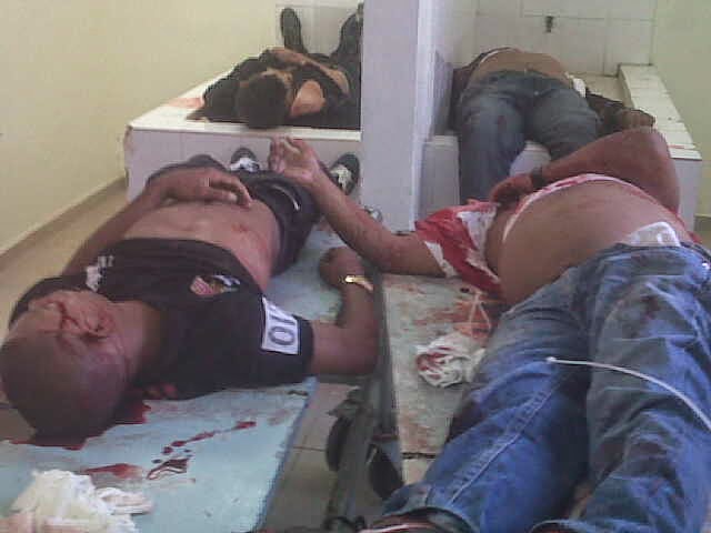 Los cadáveres de los cuatro hombres muertos en un alegado intercambio de disparos con la Policía en Galván.